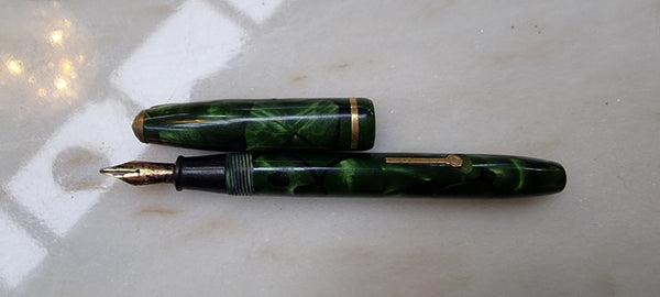 Conway Stewart  "Dinkie" 550 fountain pen green and black marble with 14k gold Nib .