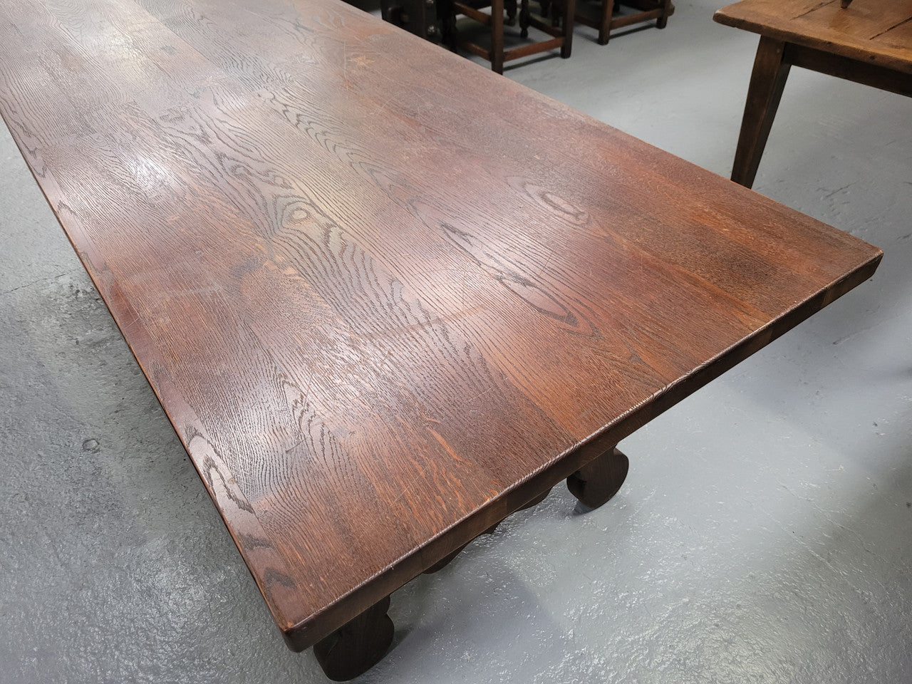 Spanish style French Oak farmhouse table with ironwork underneath. It is in good original detailed condition and has been sourced from France.