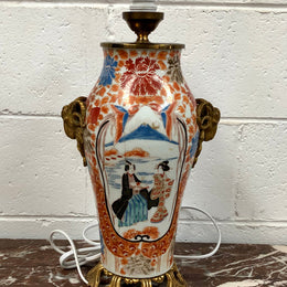 Stunning Japanese Imari style base with detailed french ormolu mounts. It is in good original working condition.