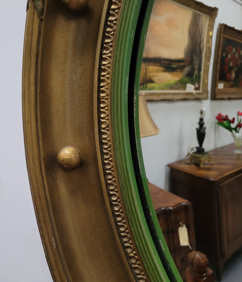 Large round French gilt framed convex mirror. It is a hard to find size with a total diameter of 67 cm. It has been sourced from France and is in good original condition.