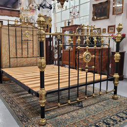 Rare Antique cast iron and brass Victorian queen size bed. Comes with custom made slats.  It has been sourced locally and is in good original condition.