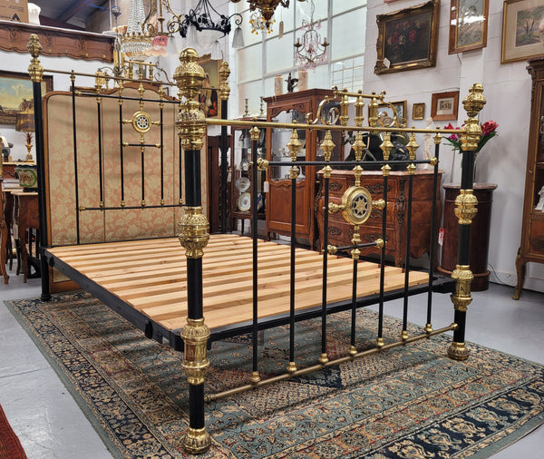 Rare Antique cast iron and brass Victorian queen size bed. Comes with custom made slats.  It has been sourced locally and is in good original condition.