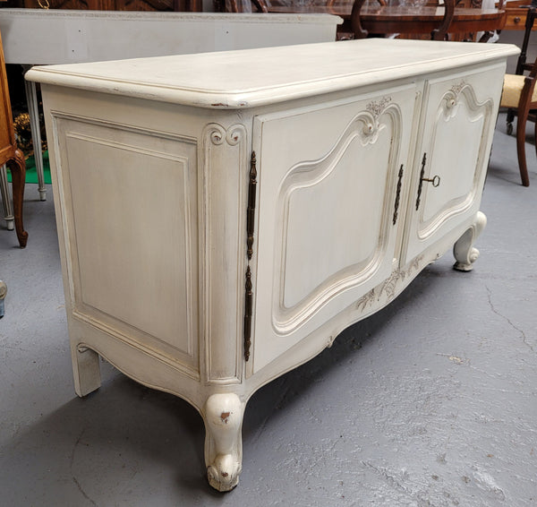 Louis XV style chalk painted two door cabinet which would also make an ideal TV cabinet. It has been sourced from France and in good original detailed condition.