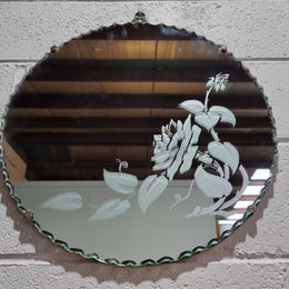 Vintage Art Deco round wall mirror with pie crust edge and etched floral design . In good condition, please see photos .