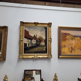 Dutch signed oil on canvas depicting village street in a beautiful gilt frame. It is in good original detailed condition and has been sourced from France.