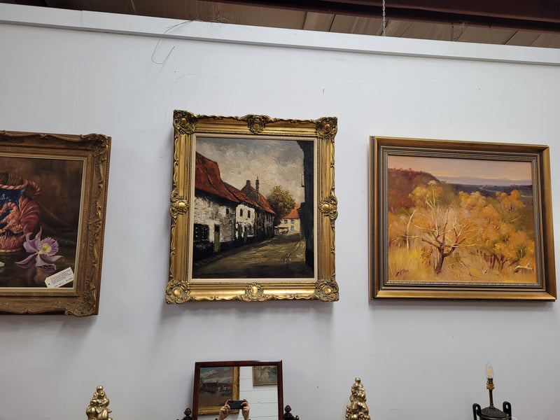 Dutch signed oil on canvas depicting village street in a beautiful gilt frame. It is in good original detailed condition and has been sourced from France.
