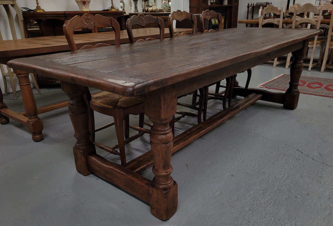 Amazing 2.65 meter French Elm Refectory dining table with loads of rustic charm. This table has been sourced from France and can comfortably seat ten people. It is in good original detailed condition.