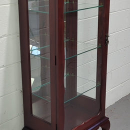 Vintage Mahogany petite display cabinet with three solid glass shelves. Ideal for a small area and is in good original detailed condition.