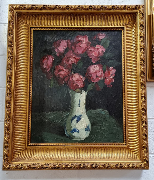 French floral signed oil painting of flowers in a vase in a stunning gilt frame. In good original condition.