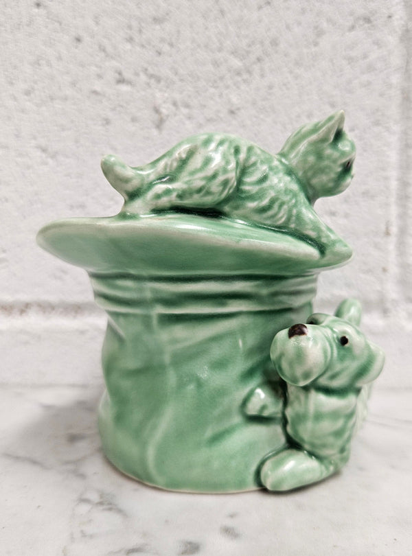 Vintage Sylvac number 1484 green cat and dog playing on top hat. Very cute and in very good condition, no chips or cracks. Please see photos as they form part of the description.