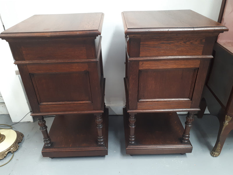 A hard to find pair of French Oak wooden top bedside cabinets. In good original condition. Circa 1920.