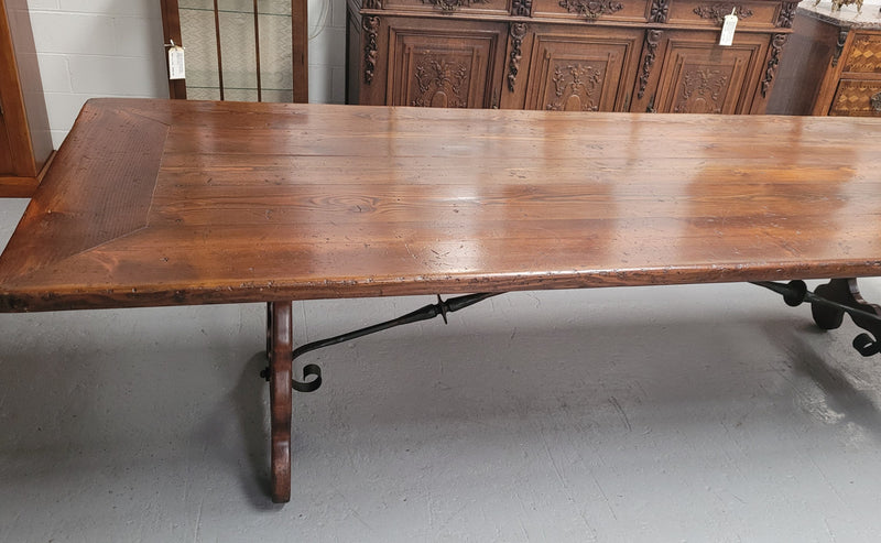 Hard to find three meter Spanish style dining table with a width of 108 cm. Made from reclaimed elm and Oregon with nice iron work. Can easily sit 10-12 people and is in good original detailed condition.