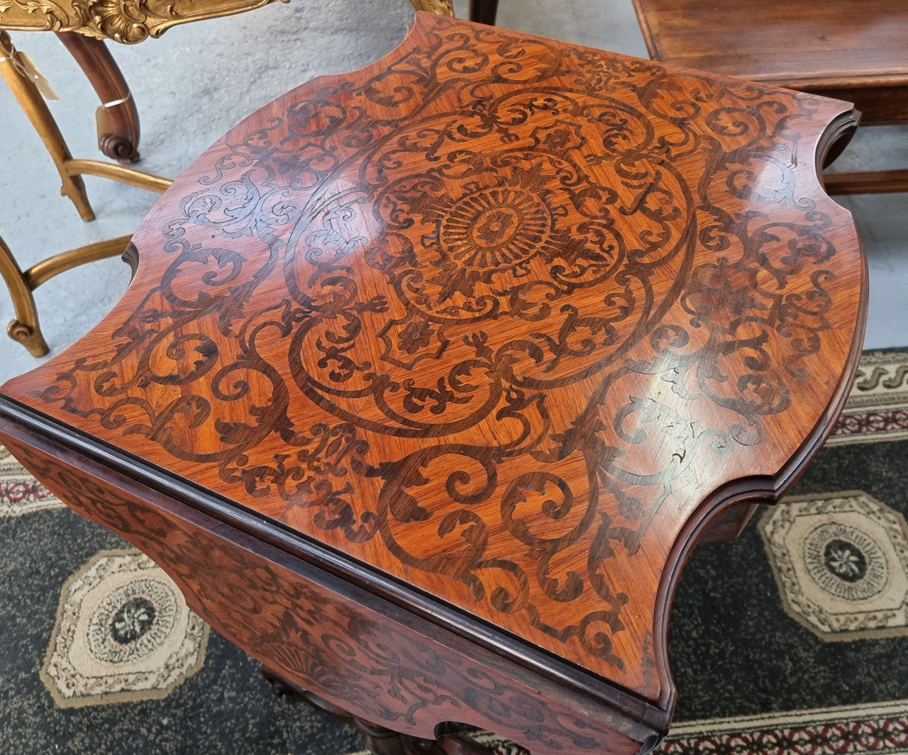 Fabulous marquetry inlaid side table with marquetry extensions and one drawer. Stunning side table or small ladies desk.