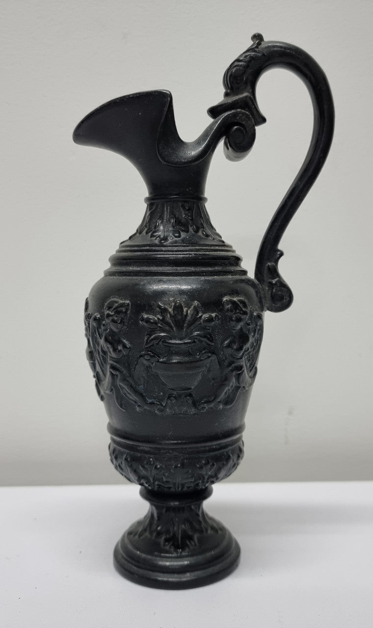 Victorian black urn shaped vase. It is in good original condition and has been sourced locally. Please view photos as they help form part of the description.