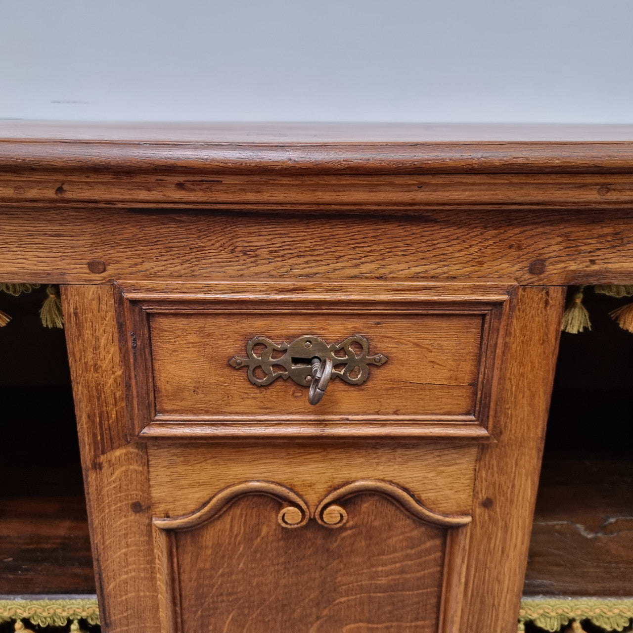 Amazing French Oak early 19th Century two door sideboard with one drawer and two fixed shelves. Sourced from France and in good original detailed condition.