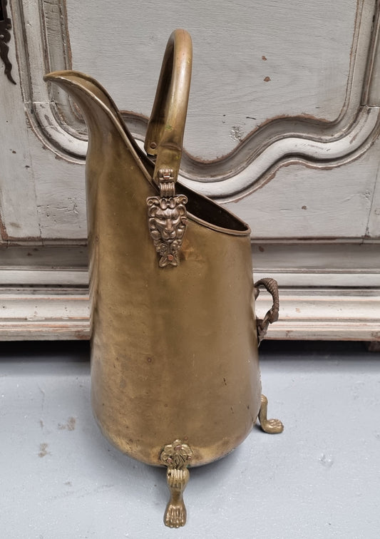 French brass coal bucket with Lion heads. In good original condition.
