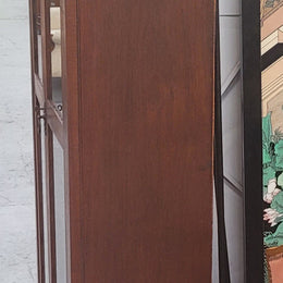 Beautiful two door Blackwood bookcase with glass doors and with four fully adjustable shelves. It is in good original detailed condition.