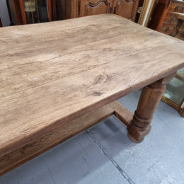 French Oak stretcher base farmhouse table with solid turned legs. It is in good original condition.