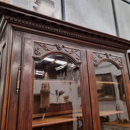 Substantial French Henry 2nd Walnut two door bookcase. It has five fully adjustable shelves and has been sourced from France. It is in good original detailed condition.