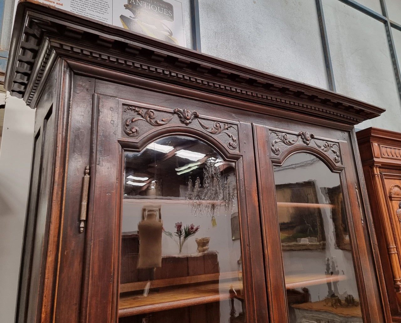 Substantial French Henry 2nd Walnut two door bookcase. It has five fully adjustable shelves and has been sourced from France. It is in good original detailed condition.