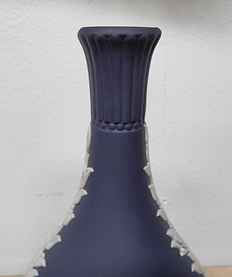 Wedgwood blue and white Jasper Ware bud vase. It is in good original condition with no chips or cracks, please view photos as they help form part of the description.