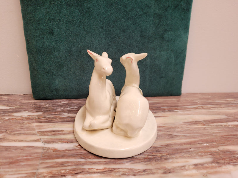Goldscheider Myott Art Deco figurine of two Gazelle figures with hand painted flowers.  Backstamp dates the figures to 1938-1950 period.  There is some light crazing.