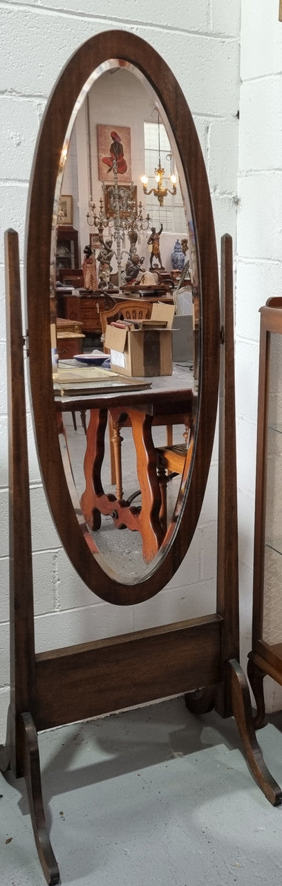 Lovely simple Antique Walnut cheval mirror with original bevelled mirror. In good original detailed condition.