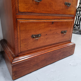 Lovely Antique English walnut tallboy/ chest of drawers. There are five drawers which all differ in sizes and have lovely hardware. It is in good original detailed condition.