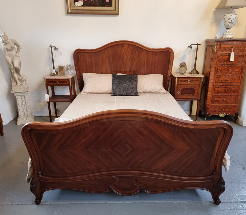 Beautiful French Walnut Louis XV style queen size bed with carving on the feet and in good original detailed condition.