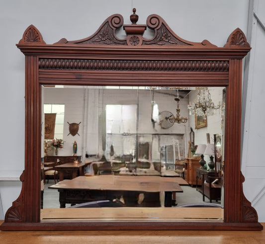 Beautiful Walnut nicely carved Edwardian mantle mirror. In good original condition and still has its original mirror.