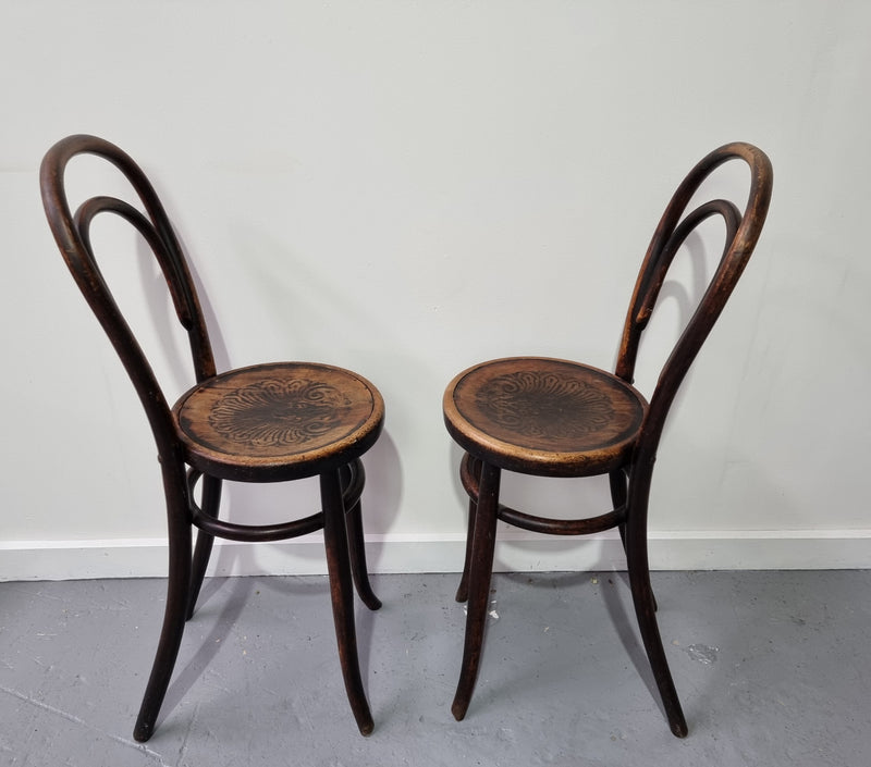 Rare petite cafe Bentwood chairs with original shell embossed seats. They are in very good original condition. They would make great addition to your breakfast bar.