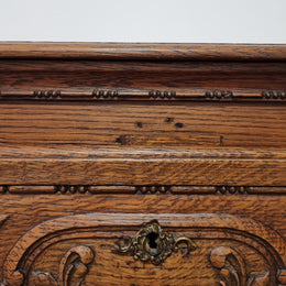 Early 19th Century French Oak chest of three drawers. It has beautiful handles and carvings. It is in good original detailed condition.