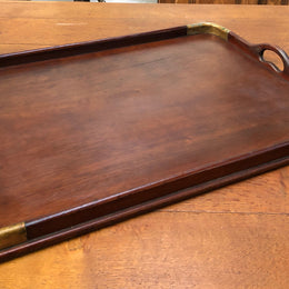 Beautiful Edwardian Mahogany and brass bound tray in good original detailed condition.
