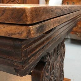 A beautiful French oak, Spanish style parquetry top extension table, with amazing carving and lovely details in very good condition.