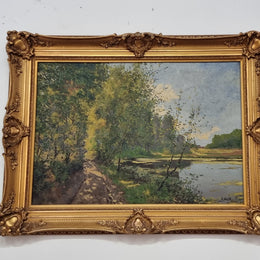 Sourced in France is this beautiful impressionist oil on canvas by "LOUIS GAROT". In a lovely ornate frame, signed and in good original condition.