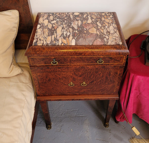 French Art Deco bedroom suite consisting of queen size bed in Amboyna wood and featuring pretty inlay. It comes with a matching pair of bedsides. It is a very stylish and high quality suite. It has been sourced from France and is in good original detailed condition.