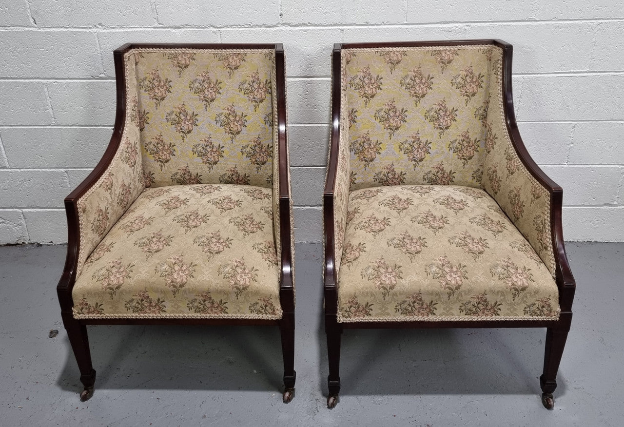 "A" Pair of Regency Style Wing Back Armchairs