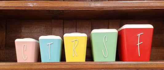 Retro Set of 5 plastic canisters for your kitchen in great colors.  All in good original condition.