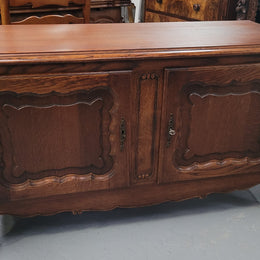 A hard to find Louis XV style French two door cabinet which would make an ideal TV cabinet. It has been sourced from France and in good original detailed condition.