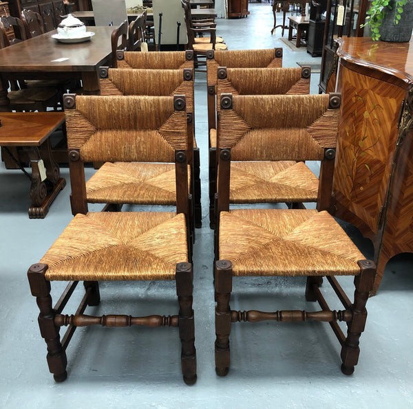 Late 19th Century set of six rush seat chairs. These chairs are very wide and deep making them very comfortable to sit on. 

They are in very good original condition.