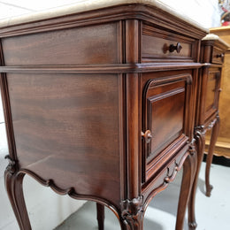 Pair of elegant Louis XV style marble top walnut bedside cabinets. One drawer and one cupboard. Circa 1900 in good original detailed condition.