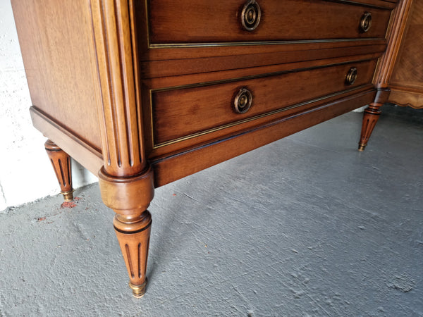 Beautiful French Louis XV Style Marble top five drawer commode. There are five drawers and it has a lovely brass inlay. It is in good original detailed condition.