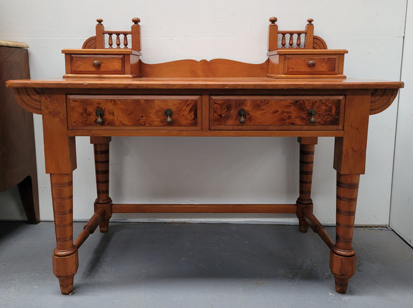 Late Victorian Huon Pine desk with two drawers. Featuring superb birdseye panels and is in good original detailed condition.