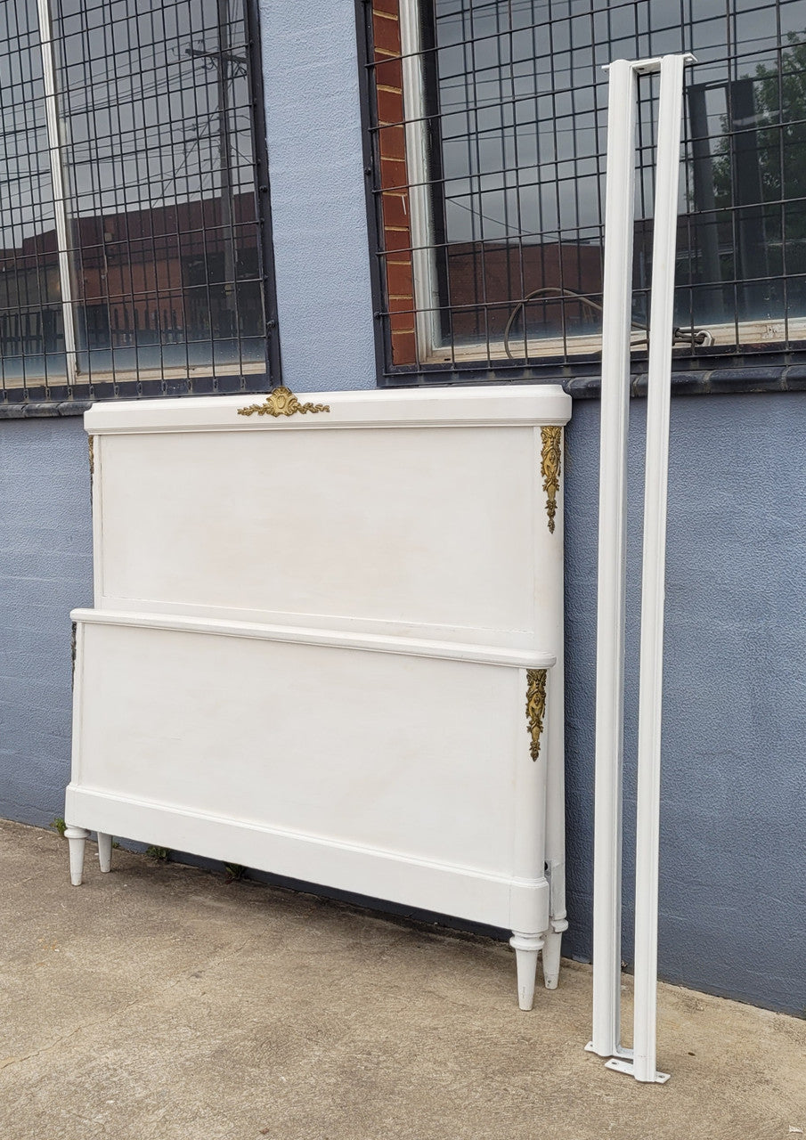 French Louis 16th style chalk painted queen size bed with gilt decorative mounts and includes custom slats. It has been sourced from France and in good original condition.