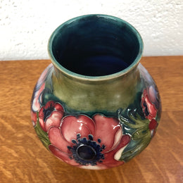 Anemone pattern hand-painted Moorcroft vase, in good condition.