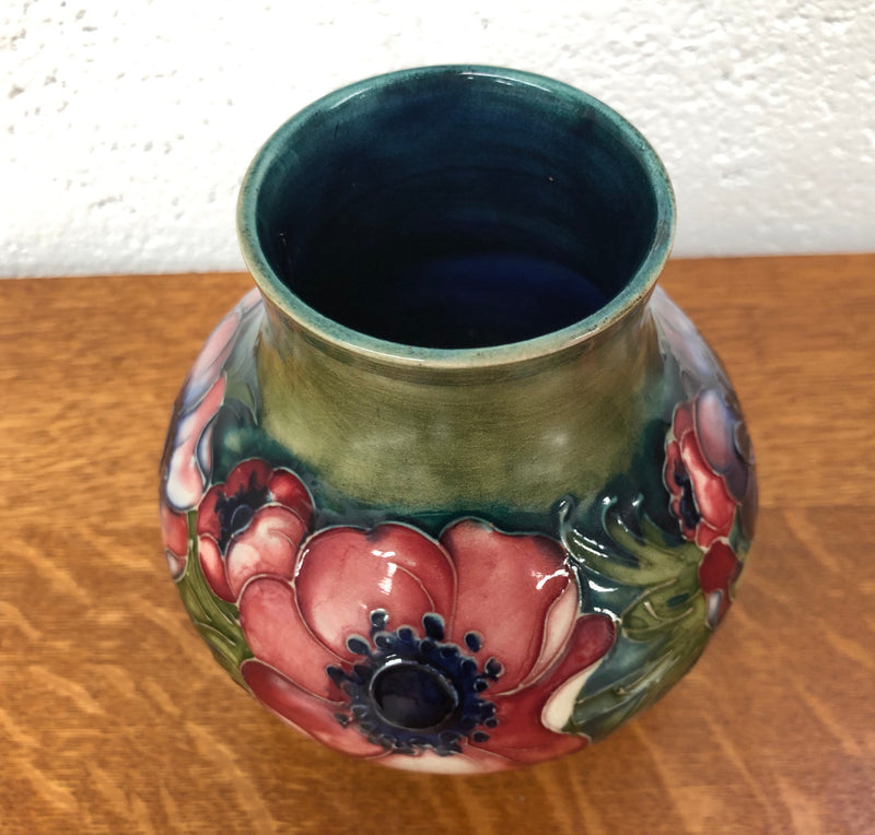 Anemone pattern hand-painted Moorcroft vase, in good condition.