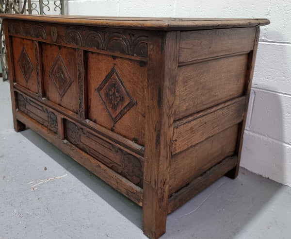 Early 19th Century French Oak carved coffer with a lift up lid for storage. A beautiful piece and in good original condition.