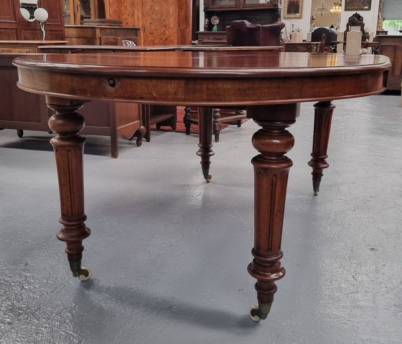 Amazing Victorian round Mahogany extension table. It comes with one extension leaf which can be added to the center of table when required. Sourced Locally and in good original detailed condition.