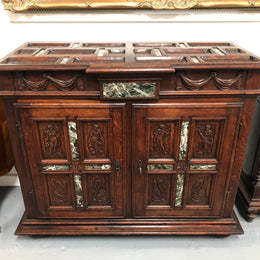 A unique 18th century French oak carved cabinet with inset marble. In good original condition.