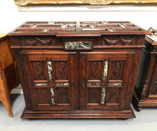 A unique 18th century French oak carved cabinet with inset marble. In good original condition.